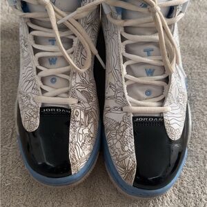 Jordan Women's Black, White, and Blue Sneakers